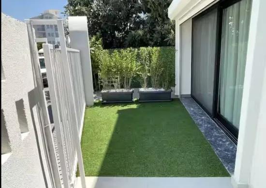 Marmaris Çıldır Mahallesi Garten Parterre Luxus Wohnungen zum Verkauf