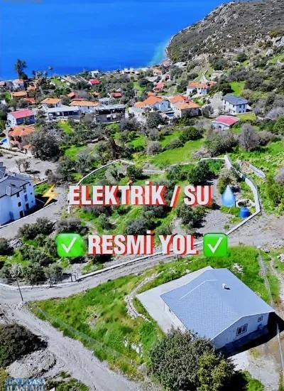 В деревне Сёгют с видом на остров Сими и морской пейзаж экологический туризм Имарли 2100 м2 участок земли