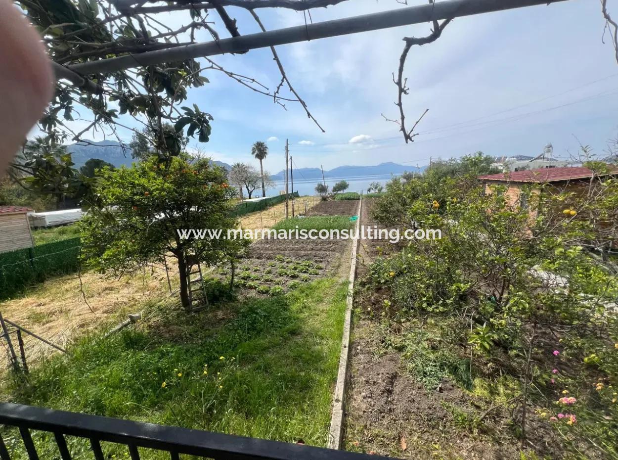 Marmaris Söğüt Mahallesi Denize Sıfır 2000M2 Arsa Satılık Müstakil Ev.önüne Tekne Bağlamaya Uygun.